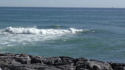 Sea ocean waves white caps rocks Stock Footage 74589352