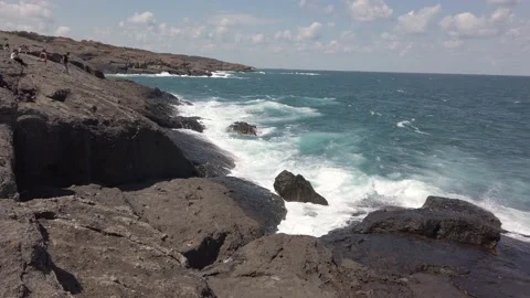 Sea or ocean. Big waves, white foam. Rocky seashore. Stock Footage 138520898