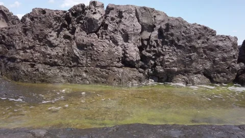 Sea or ocean. Big waves, white foam. Rocky seashore. Stock Footage 138520902