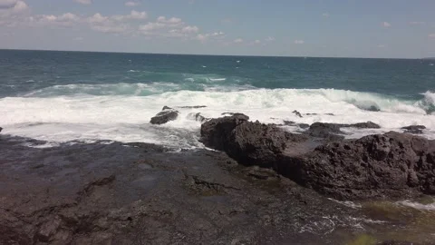 Sea or ocean. Big waves, white foam. Rocky seashore. Stock Footage 138520906