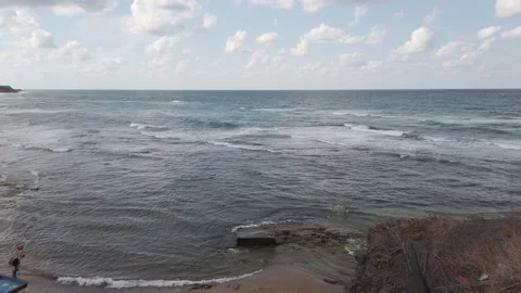 Sea or ocean. Big waves, white foam. Rocky seashore. Stock Footage 138520912
