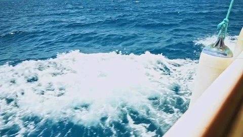 Sea or ocean slpash waves and foam after motor boat or yacht Stock Footage 234047970