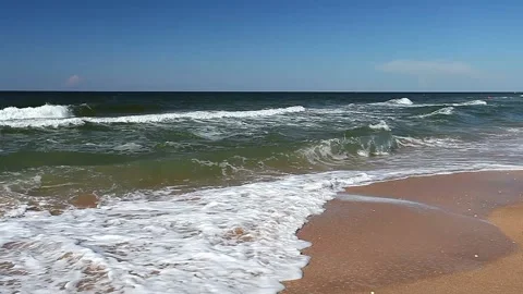 Sea or ocean, surf on a sandy beach. 스톡 동영상 137627052