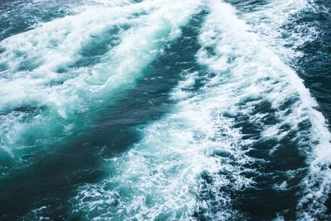 Sea or ocean waves surface texture. Abstract summer blue water background with Stock Photos