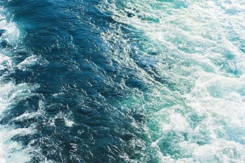 Sea or ocean waves surface texture. Abstract summer blue water background with Foto stock