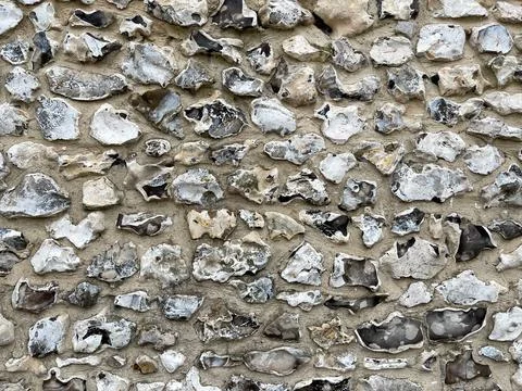 Sea pebble wall close up texture Stock Photos