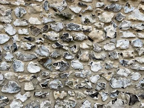 Sea pebble wall close up texture Stockfoto's