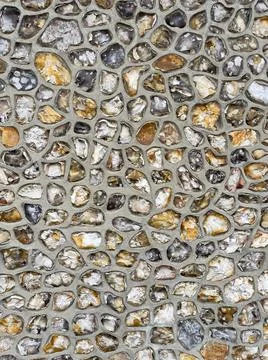 Sea pebble wall close up texture Stock Photos