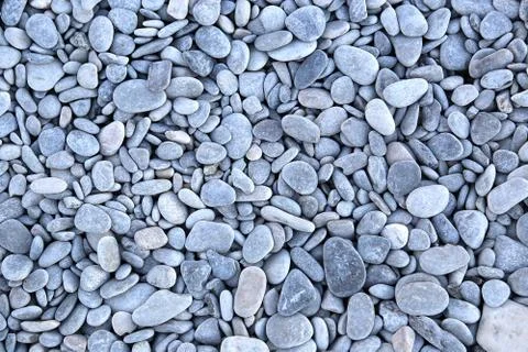 Sea pebbles background Stock Photos