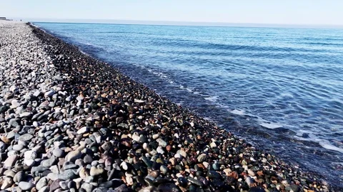 Sea pebbles beach perspective Stock Footage 105722914