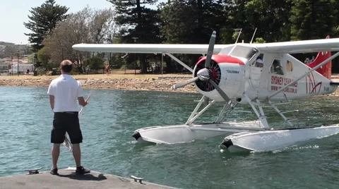 Sea plane docking in bay Stock-Footage 59643851