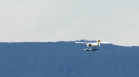 Sea plane flying over mountains in Vancouver, British Columbia. Stock Footage 55109706