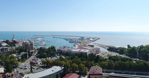 Sea port of Sochi on the background of the sea. Quadcopter flight Stock Footage