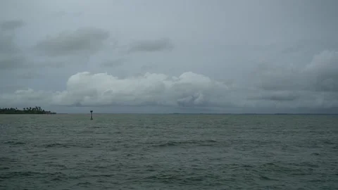 Sea before the rain. Black clouds and mountains. Stock Footage 140237455