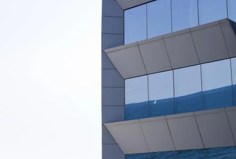 Sea reflected in the windows. Stock Photos