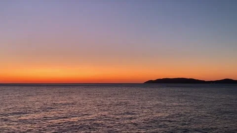 The sea right before the sun rises Stock Footage 247679287