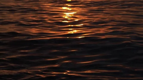 Sea ​​ripples at sunset, background Stock Footage 247351941