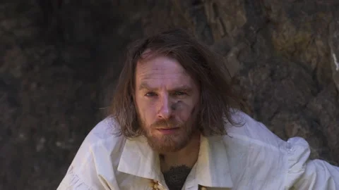 Sea robber captain of pirate ship armed with treasure chest in cave Stock Footage 201047615