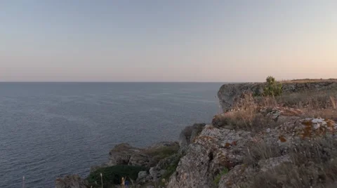 Sea Rocks and Grass in the Wind 4K Stock Footage 66561899