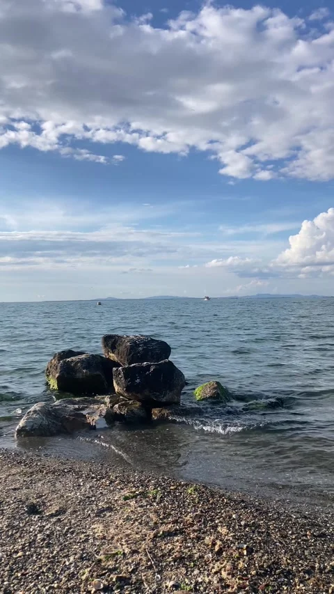 Sea Rocks on the Beach in Slow-motion (Vertical Video) Stock Footage 326806471
