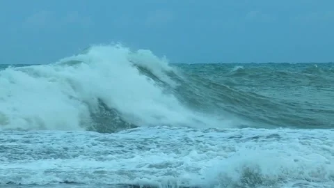 The sea is rough, waves beat against the rocks, several shots of the storm. Stock Footage 135350791
