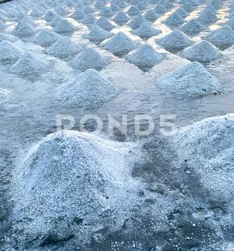 Sea salt farm at Samut Sakhon, Thailand. Organic sea salt. Evaporation and cr Stock Photos