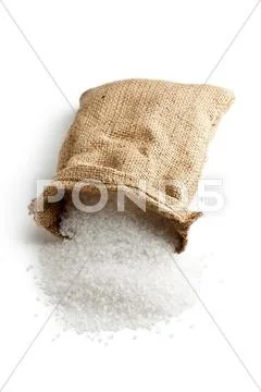 Sea salt in jute sack Stock Photos
