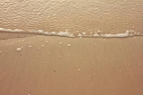 Sea with sand Stock Photos