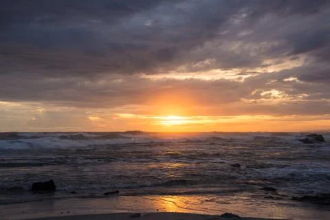 Sea scape waves sunset Stock Photos