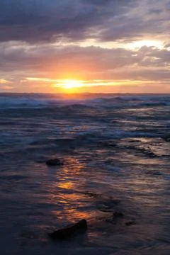 Sea scape waves sunset Stock Photos
