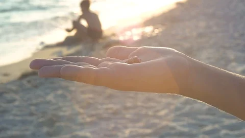 Sea shell in the palm of your hand Stock Footage 102904390