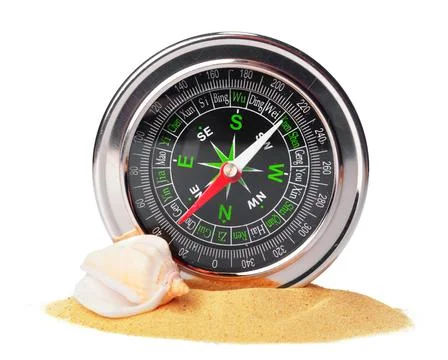 Sea shells and old compass with sand isolated on white background Stock Photos