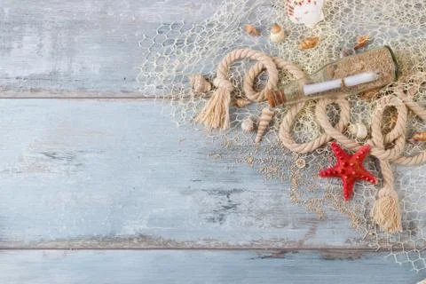 Sea shells in a fishnet Stock Photos