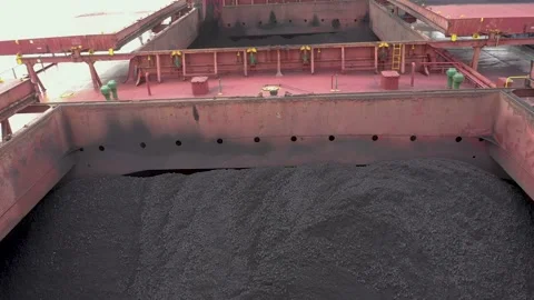 Sea ship hold is loaded by coal. Stock Footage 219972944