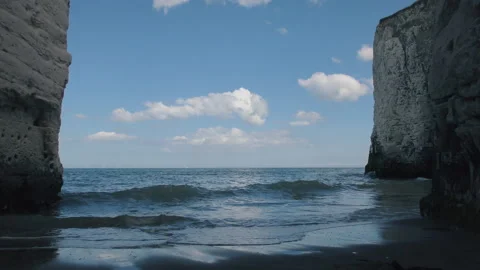 The sea shore between white rocks. England, Britain. Stock Footage 90223725