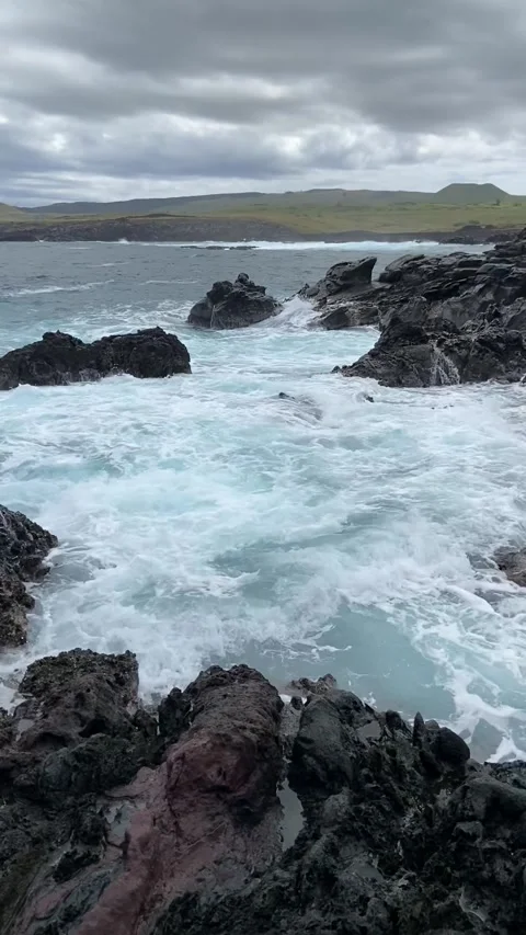 Sea shore with volcanic rocks in Easter Island 動画素材 342841636