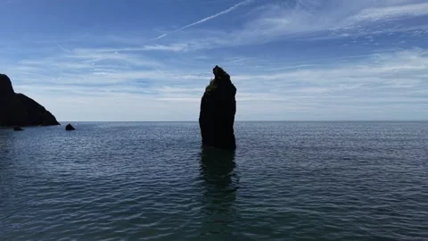 Sea Stack and Calm Sea at Ballydwan Beach Waterford Ireland Stock-Footage 337398073