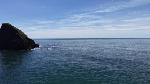 Sea Stack and Open Sea at Ballydwan Beach Waterford Ireland Stock Footage 337398056