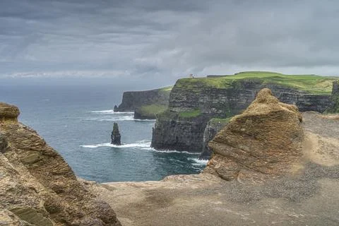 Sea stack and rock formations on iconic Cliffs of Moher, Ireland Stock Photos