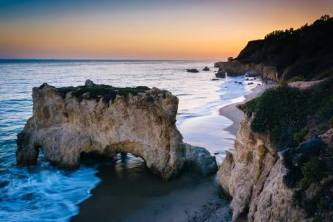 Sea stack and view of the Pacific Ocean at sunset, from cliffs at El Matador  Stock Photos