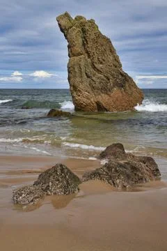 Sea stack Cullen beach Stock Photos