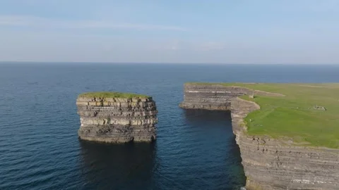 Sea Stack Dun Briste Beside Sheer Coastal Cliffs, Daytime Drone. R R Mayo Stock Footage 342666171