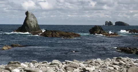 A sea stack at Fethaland point, the most northly tip of  Mainland Shetland, S Stock Footage 337948922