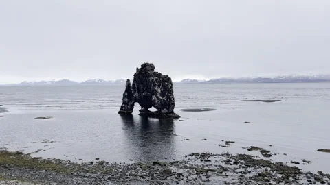 Sea stack landmark Iceland waves crashing and breaking in Iceland ocean  4k hdr Stock Footage 279026682