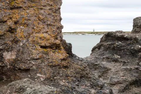 Sea Stack with Light House Stock Photos