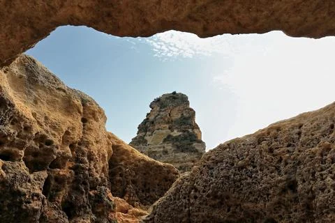 Sea stack point-natural arch-Praia da Marinha and Mesquita Beaches. Lagoa-PT Stock Photos