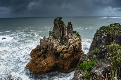 Sea Stack Rising from the Ocean at the Edge of Pancake Rocks, Punakaiki, West Stock Photos