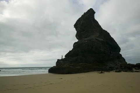 A sea stack shaped like the British Isles at Bedruthan Steps in Cornwall UK Stock Photos