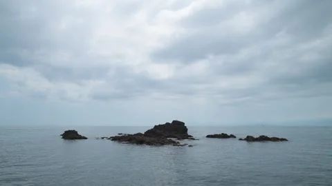 Sea stack in the water, Izu Peninsula Stock Footage 340241781