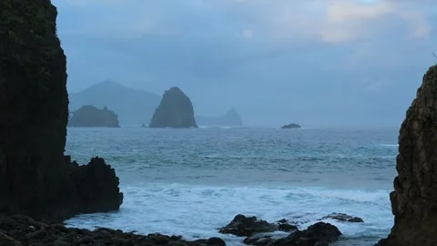 Sea stacks and dramatic clouds in Izu peninsula, Shizuoka Prefecture, Japan Stock Footage 249639104